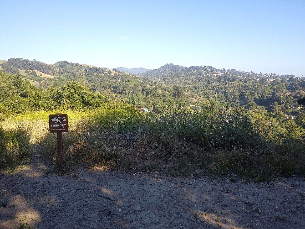 Trail entrance sign in Wildcat Canyon Park with natural landscape